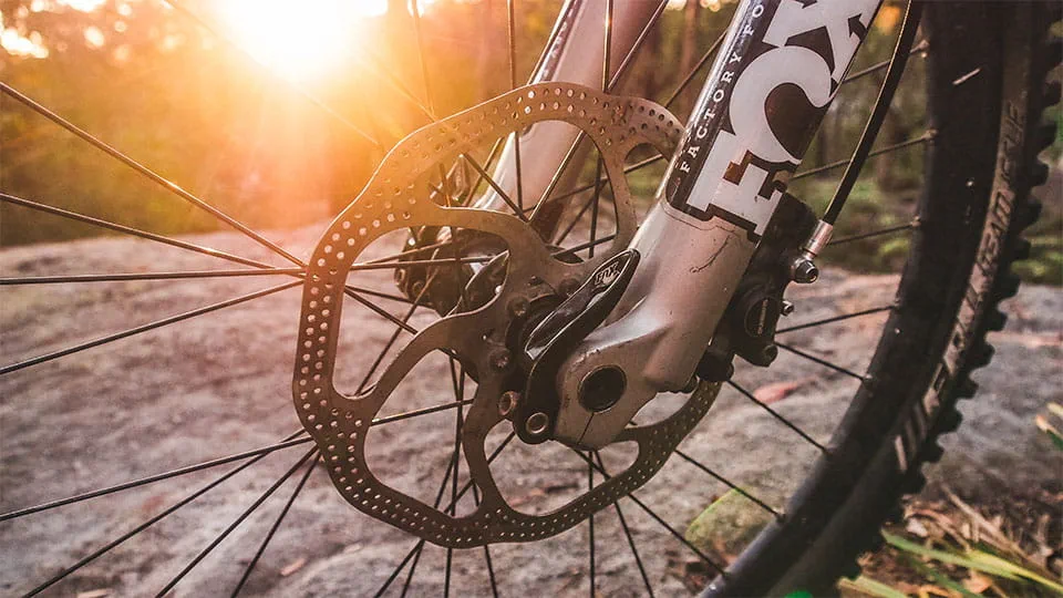 How do you clean disc brakes?