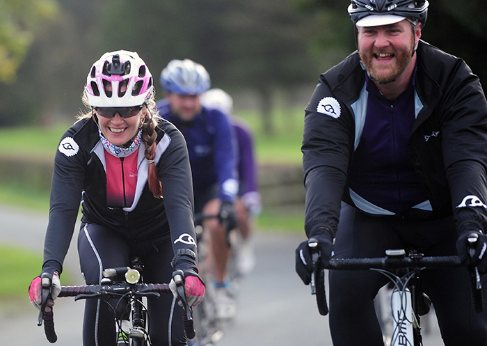 Road cyclists two abreast