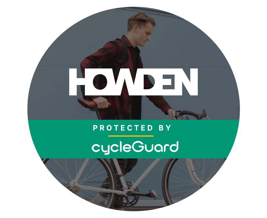 Young male student cyclist pushes back, overlay text reads 'Howden insurance in partnership with cycleGuard'.